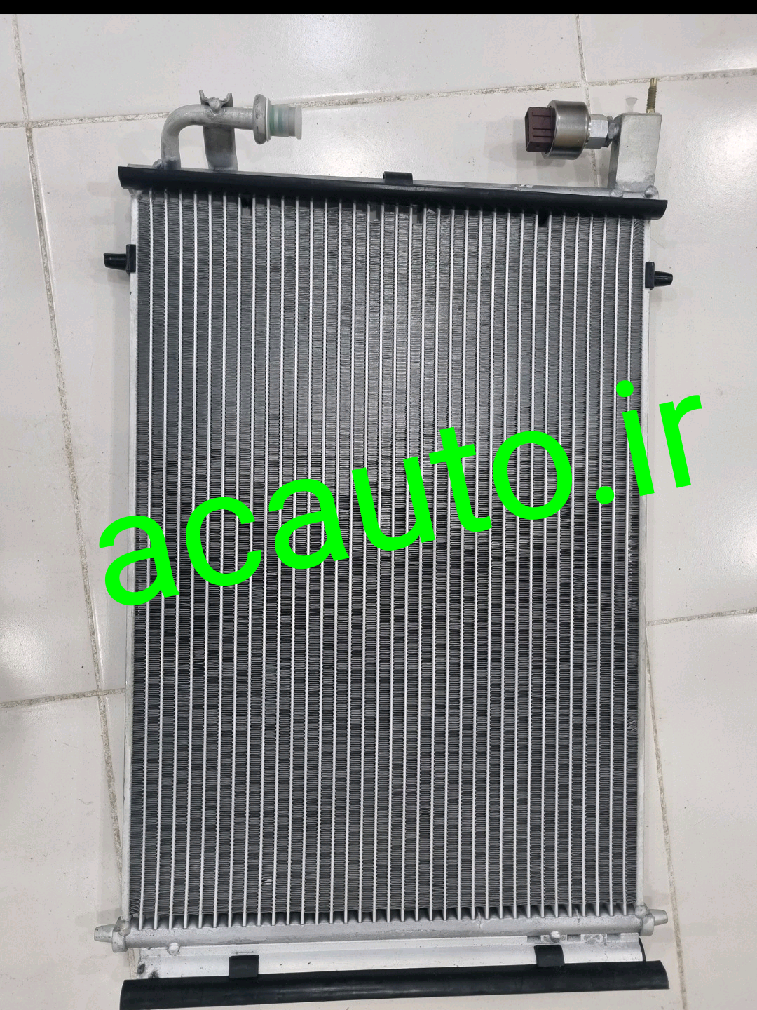 تصویر کندانسور کولر پژو ۲۰۶ سابکول دار همراه با سوییچ فشار ( سردساز) 